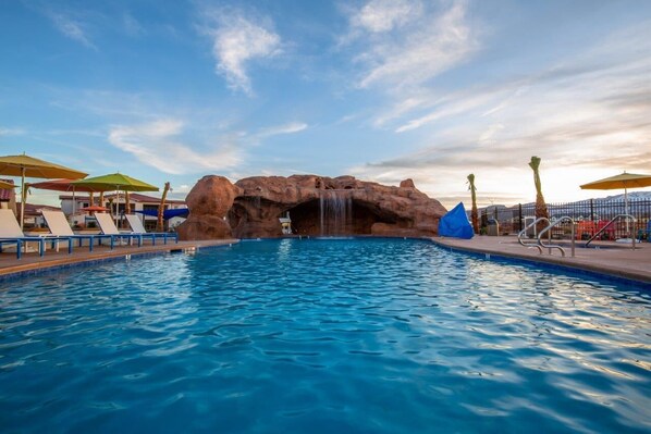 Large upper pool with red rock arches and waterfalls