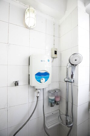 water heater, shampoo, shower cream provided.