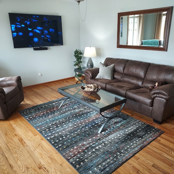 Living room with 65' Smart tv