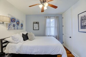 relax in the queen-sized bed and fresh white linens