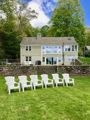 South-facing lawn offers sunshine and relaxation for a friends or family getaway