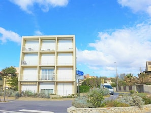 Cloud, Sky, Plant, Building, Property, Azure, Window, Tree, Urban Design, Asphalt