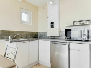 Countertop, Cabinetry, Kitchen Sink, Sink, Building, Kitchen Appliance, Kitchen, Kitchen Stove, Home Appliance, Tap