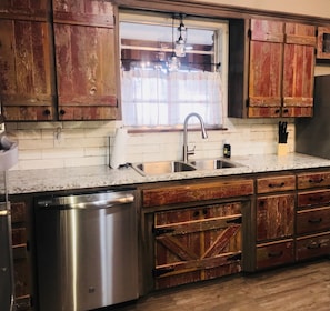 Fully remodeled kitchen. All new appliances. Custom barn wood cabinets. 