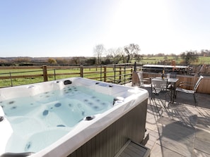 Luxurious hot tub on paved patio | The Retreat - Broadstone Barns, Ticknall, near Derby