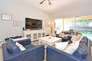 Cozy, comfortable and spacious great room featuring the art of David Buckley
