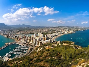 Cloud, Water, Sky, Water Resources, Building, Mountain, Blue, Skyscraper, Natural Landscape, Cityscape