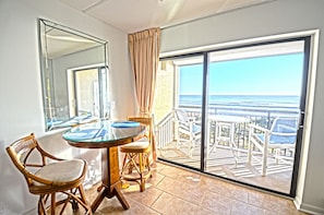 Enjoy high-top dining for 2 inside or outside while taking in the ocean views.