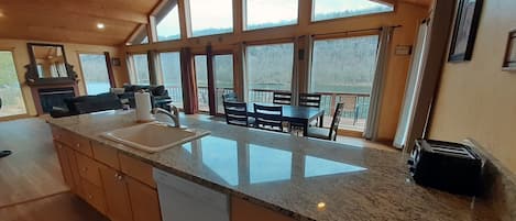 Upstairs fully equipped kitchen & living w/White River views