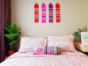 Secondary bedroom with 5-feet Sealy mattress, pillows, comforters and sheets.