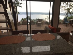 View from Kitchen Bar to Patio and Lagoon