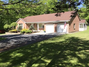 Open and ample parking spaces. Paved  circular driveway 