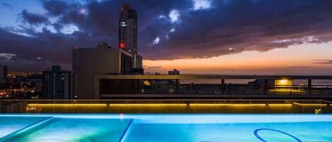 Enjoy a night swim in the rooftop pool