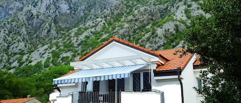 Large balcony with awning.
