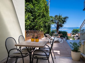 Plant, Furniture, Table, Property, Sky, Building, Chair, Flowerpot, Outdoor Furniture, Shade