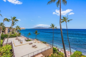 View from your lanai of the island of Lana'i, the sundeck and the coastline.