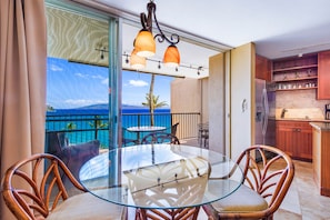 Ocean view from the dining area & couch wall. Floor to ceiling sliding doors.