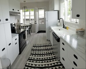 Renovated kitchen with view of the Emporia Country Club.