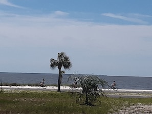 View of the ocean, standing on front of house.Bicycles and scooters are provided