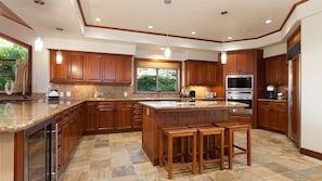 Ample seating in the main kitchen and adjoining island