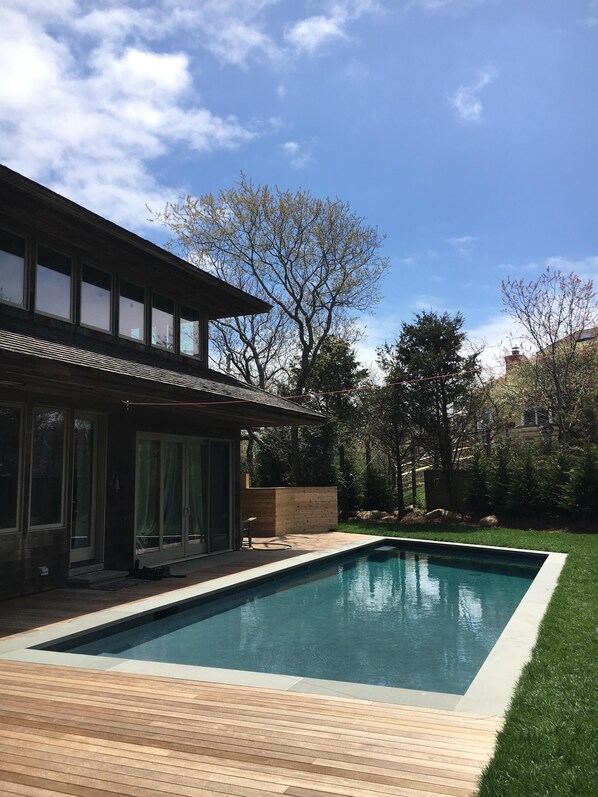 Stunning backyard pool perfect for entertaining or sitting poolside with friends