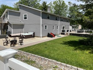 Backyard. View of patio and deck.