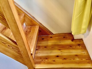 Downstairs steps to bedroom