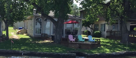 Back of cabin and deck facing the lake.