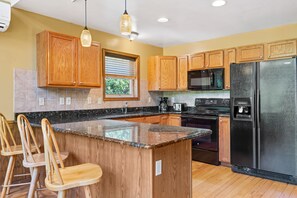 kitchen with fridge and nearby sink