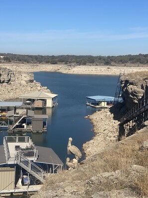 1-26-24: dock in 10ft of water.  Must wear shoes to get from steps to dock.