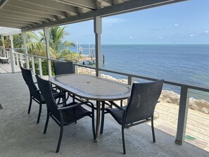 Dine with a stunning Gulf-front view right on your private patio