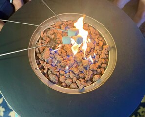 Gather ’round the patio firepit for unforgettable family fun & sweet memories!