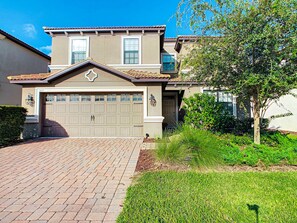 Driveway can fit 4 compact vehicles or 2 large vehicles. Extra parking on street