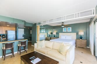 Ilikai Hotel's Deluxe One-Bedroom Unit with views of the Ala Wai Yacht Harbor and Ala Moana Beach!