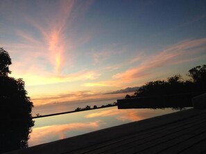 Watch the sunset over the Caribbean Sea!
