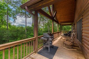 Covered Porch with Mountain View, Grill, and Seating
