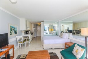 Dining table for 2 and view of living space