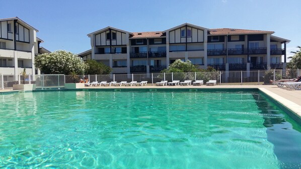 Spend time in the seasonal pool with family and friends.