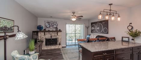 Open concept kitchen, dining and living area.