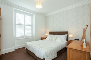 Master bedroom with King size double, drawers,dressing table,hairdryer  and ward