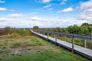 The private boardwalk extends from the house to the sand!