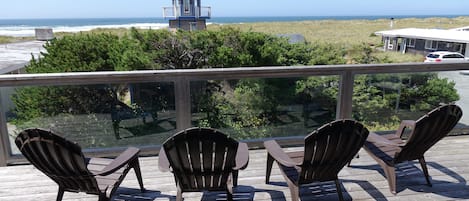 Room for all to gather on an upper deck. Lounge and listen to the Pacific Ocean.