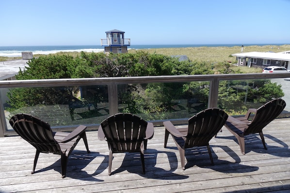 Room for all to gather on an upper deck. Lounge and listen to the Pacific Ocean.