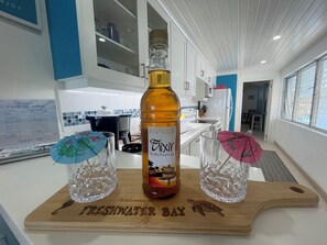 Enjoy our family brewed Rum Punch to start your holiday.