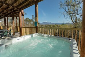 Unwind with a soak in the hot tub while soaking in the view