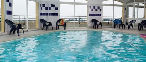 Dive into the shared indoor pool after a great day outside.