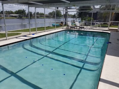 WOW Waterfront Heated Pool Home by BEACH Sleeps 12