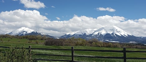 Spanish Peaks Mountains.  House is on the right shoulder of the right peak.