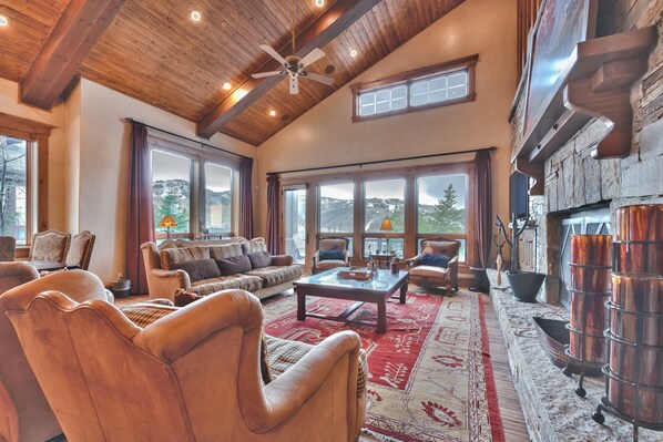 Comfortable Living Room with a Vaulted Wood Ceiling