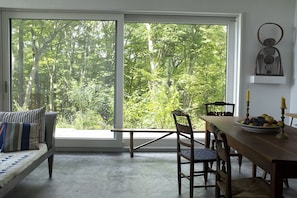 huge sliding door screened opens to the outdoors 